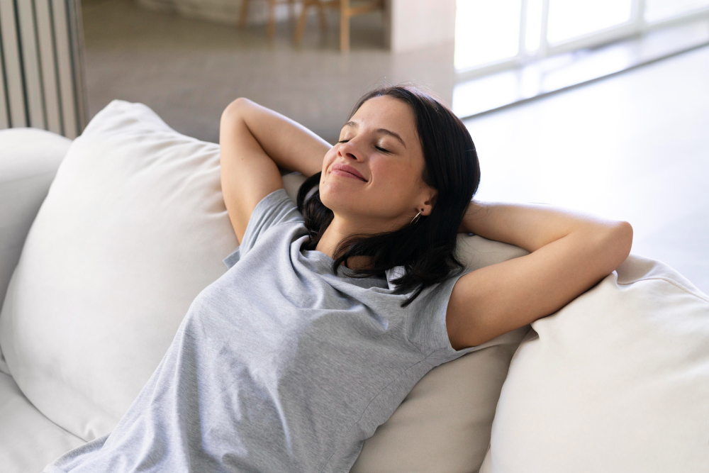Woman smiling relaxed on couch